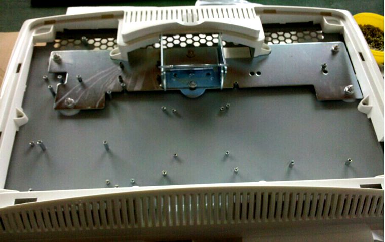 Plastic part and metal part